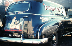 Doug Stevens behind a car